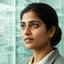 Dr Priya Khan, Lead Analyst, examining industrial ecology data